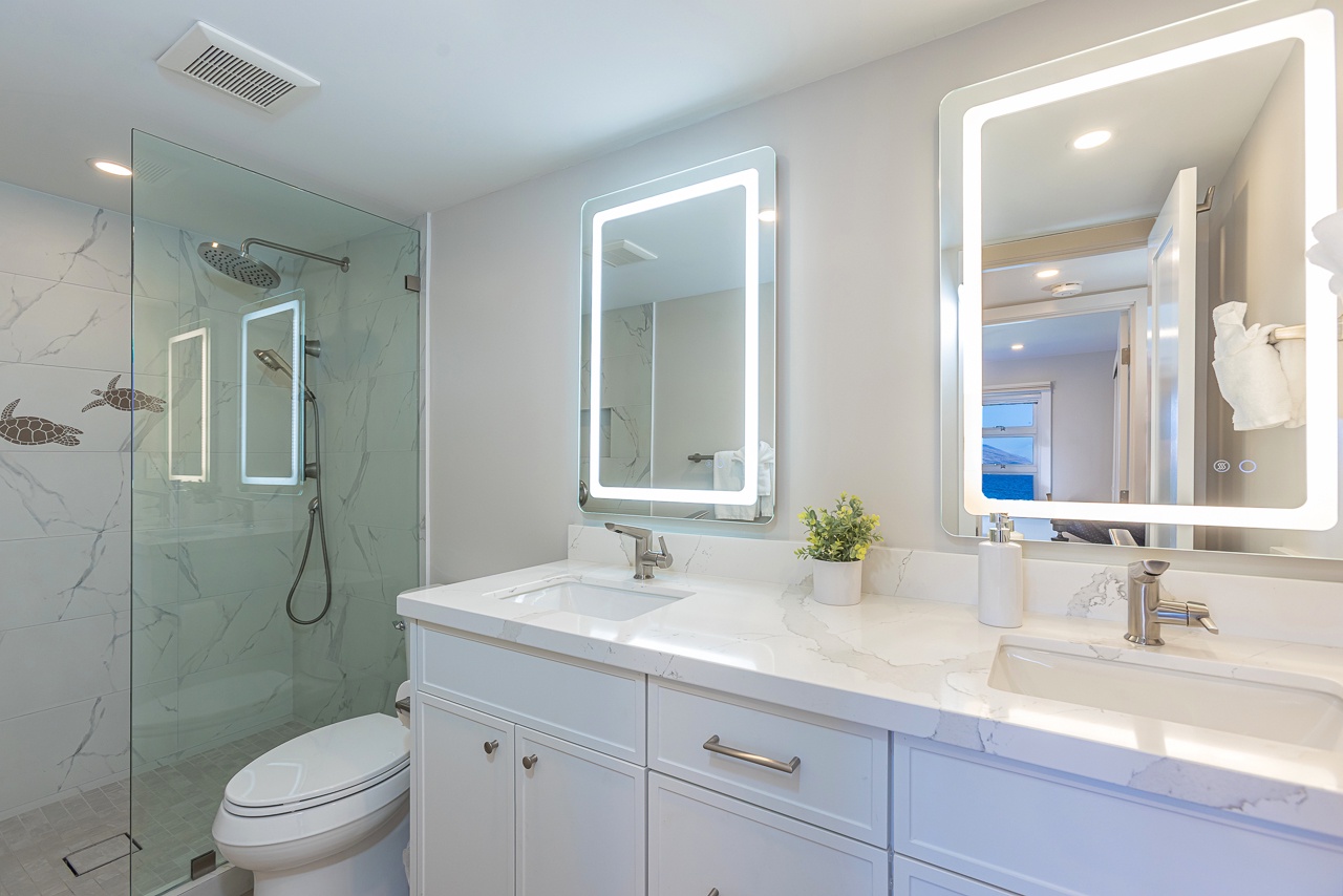 Spacious ensuite with glass shower and updated finishes