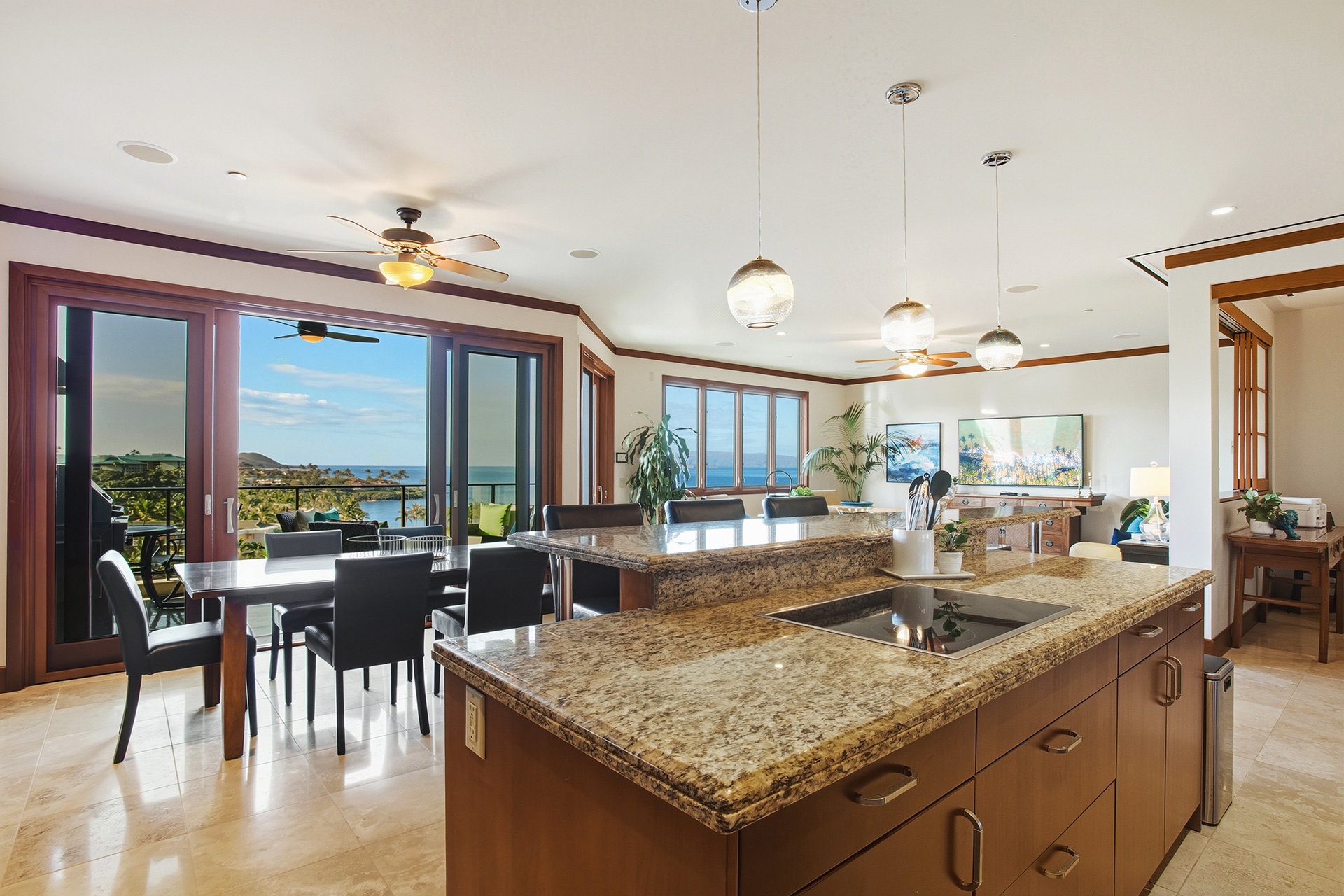 Seamless flow from kitchen to dining and lanai living