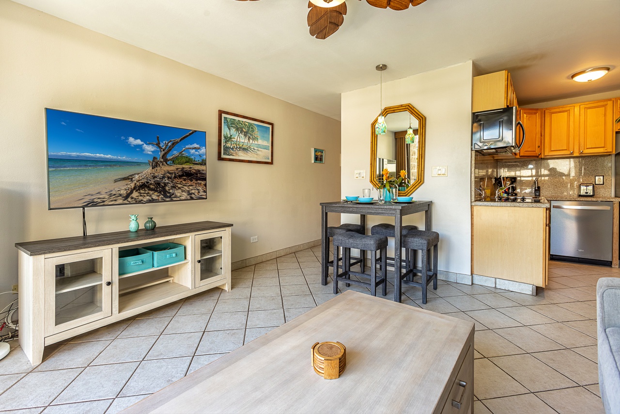 Your island-inspired retreat flows seamlessly from living to dining to kitchen, with warm wood tones, tasteful décor, and airy openness that invites you to unwind and savor every moment.