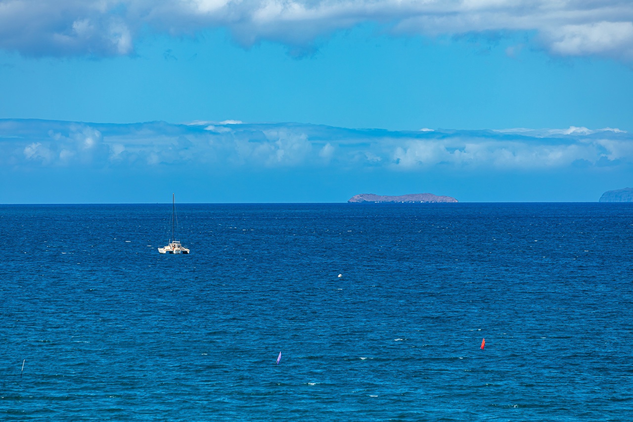 Enjoy the gentle waves and sparkling blue waters