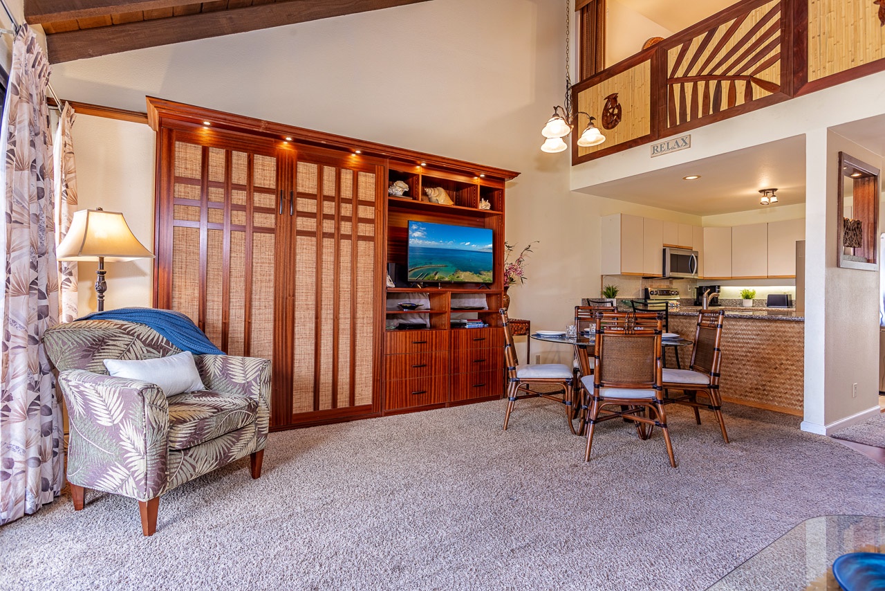Unwind in this spacious, tropical-inspired retreat with vaulted ceilings and warm island décor. Your open living space flows into a full kitchen and dining area, creating the perfect setting for family meals and relaxation.
