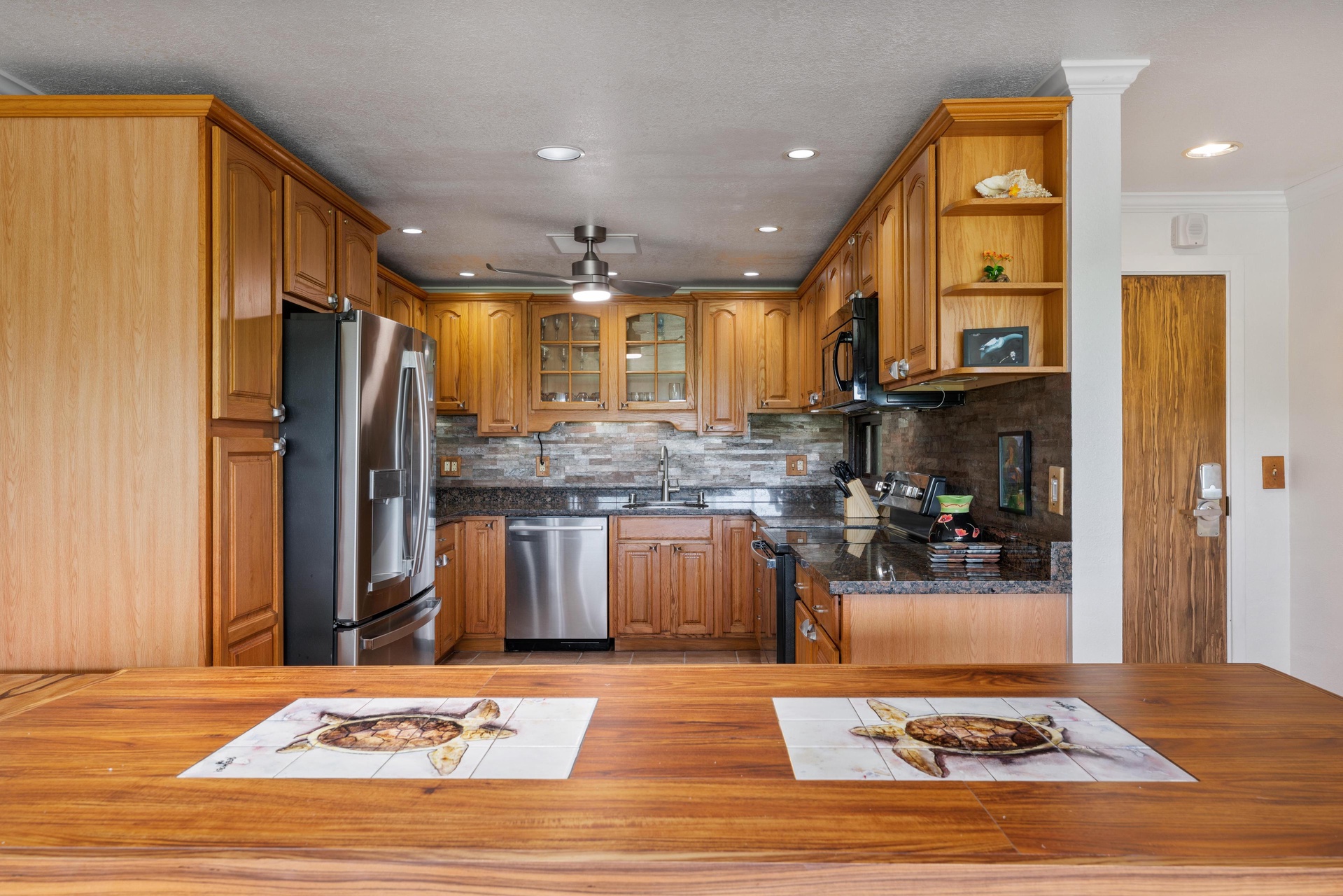 Open kitchen allows you to still be apart of the conversations