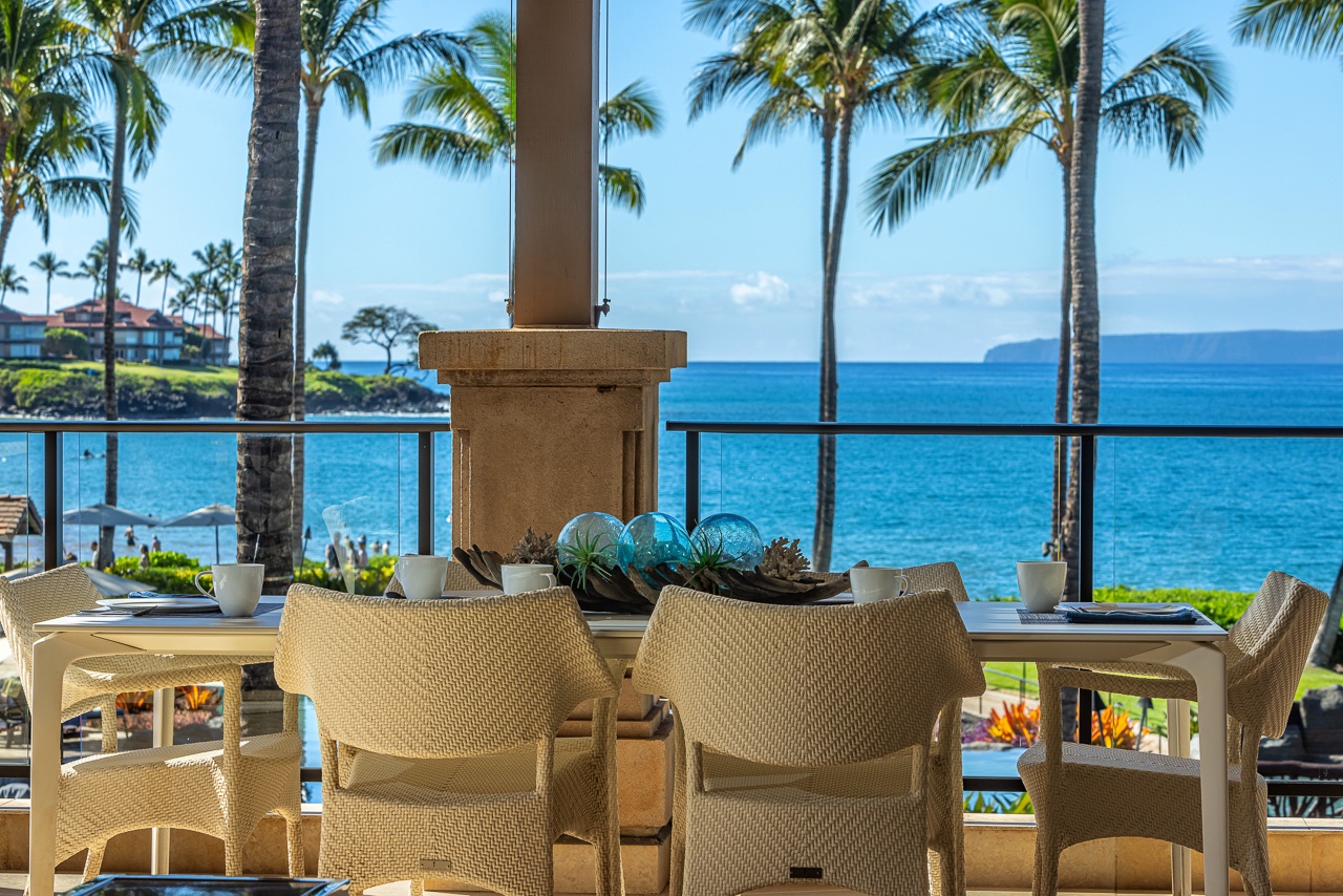 Gather around your table with tropical breezes and sparkling ocean waters framing your Hawaiian getaway, where palms sway and turquoise views stretch beyond the horizon.