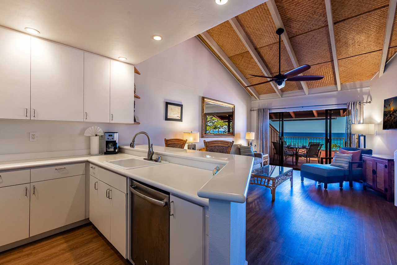 The kitchen flows seamlessly into the living space, perfect for preparing meals.