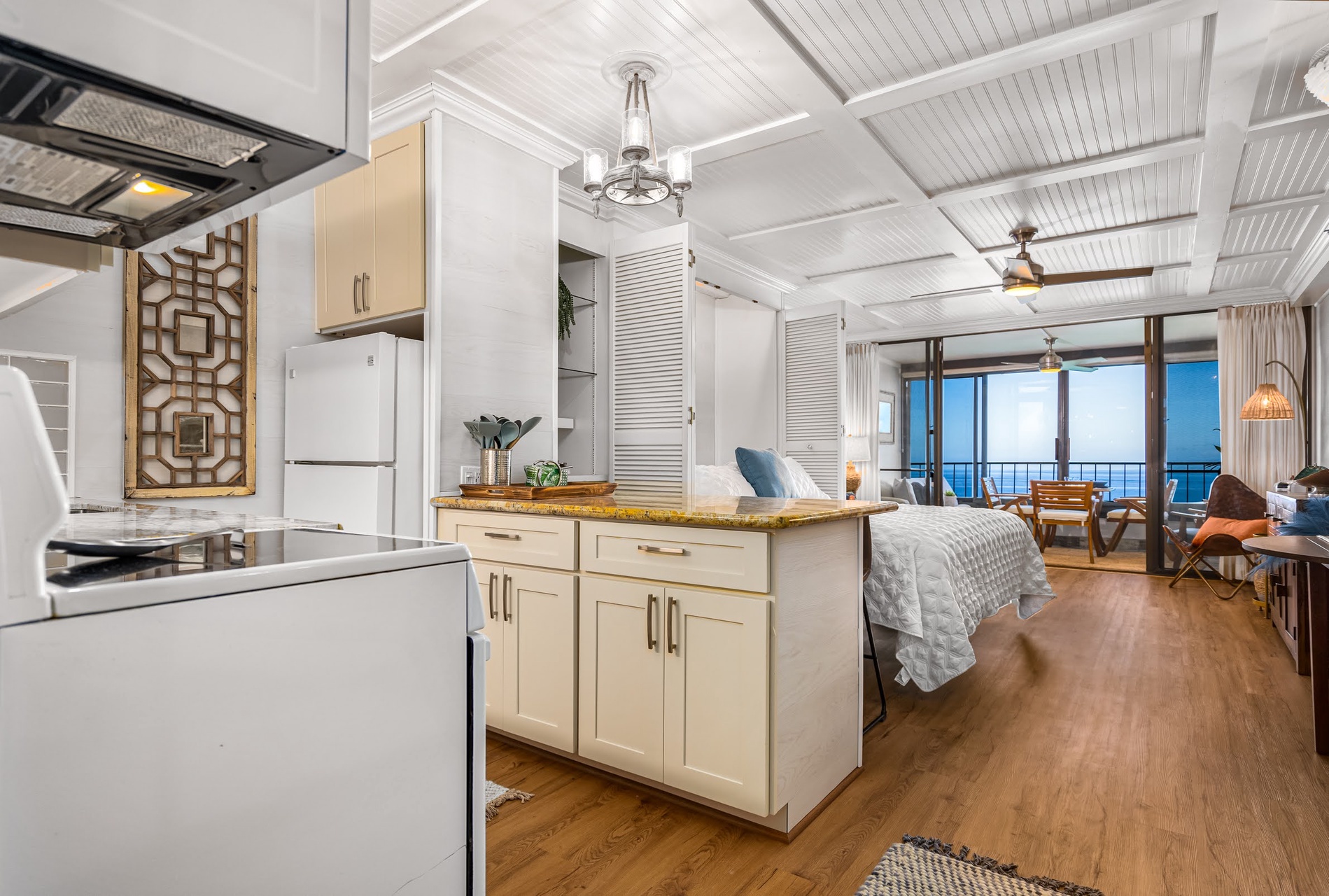The open floor plan flows effortlessly, with breathtaking blue horizons from your balcony.