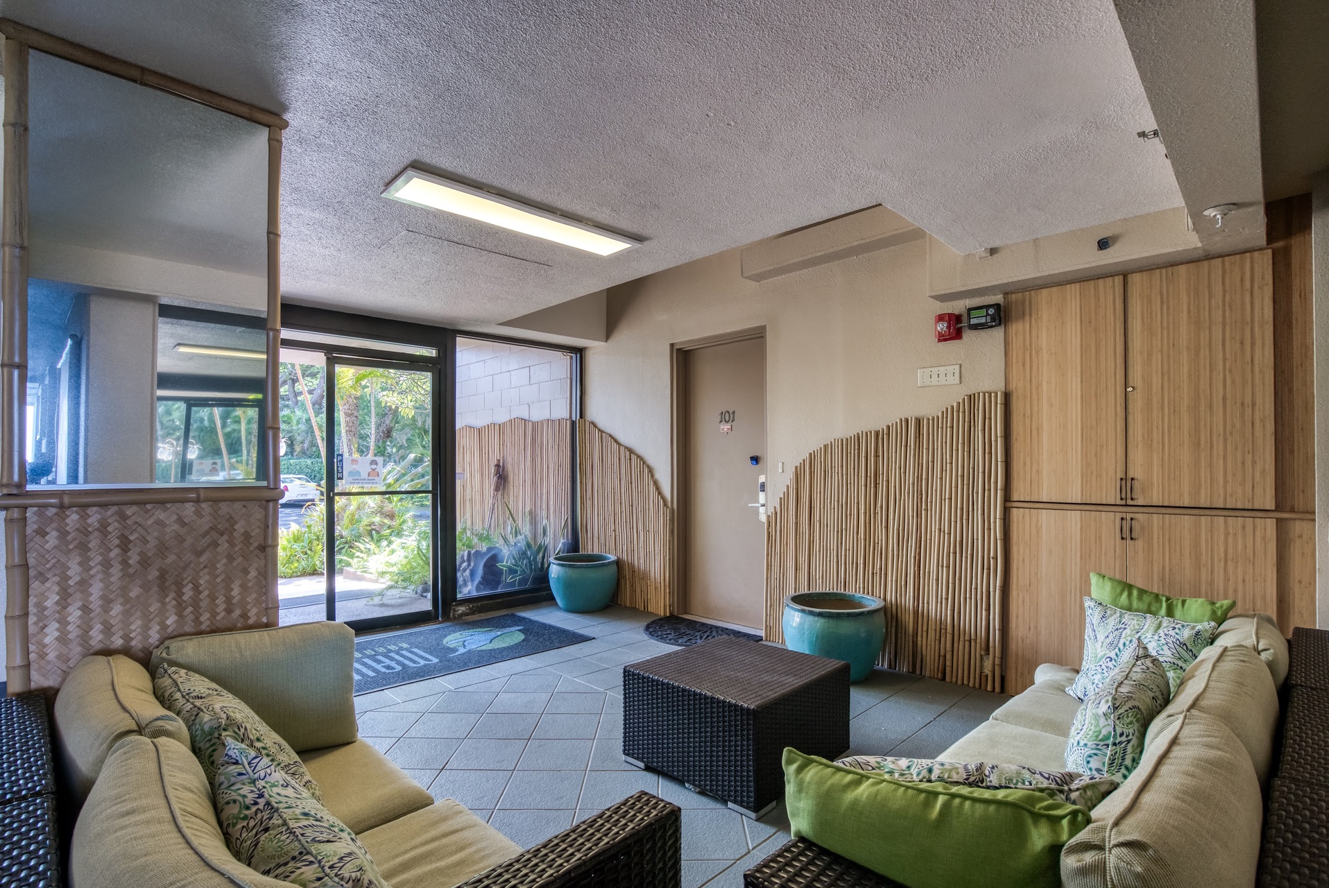 Relax in the inviting lobby with cozy seating and tropical touches—your getaway begins the moment you arrive.