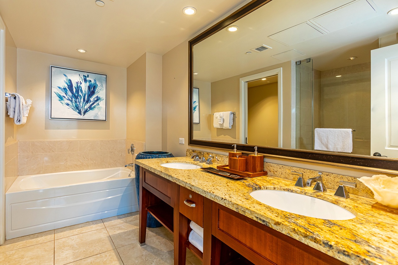 Refresh in your en-suite bathroom with a soaking tub, dual vanities with granite counters, and plush towels waiting for you.