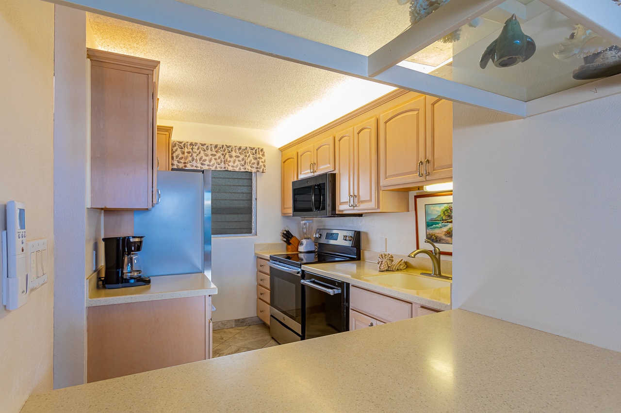 Fully equipped kitchen set up to make meals or quick  snacks.