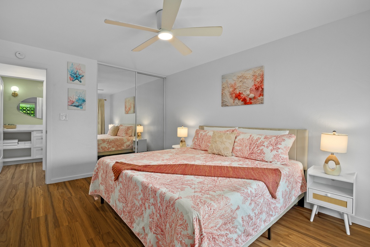 Unwind in your peaceful retreat with coastal-inspired décor, a plush king bed, and a ceiling fan to keep you comfortable as you drift off to sleep.
