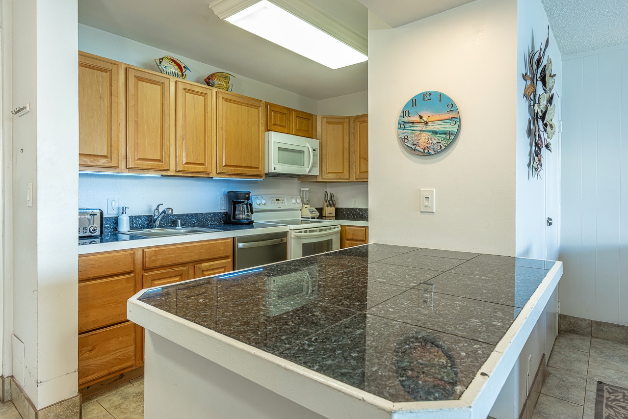 Fresh modern kitchen with room for family meal prep