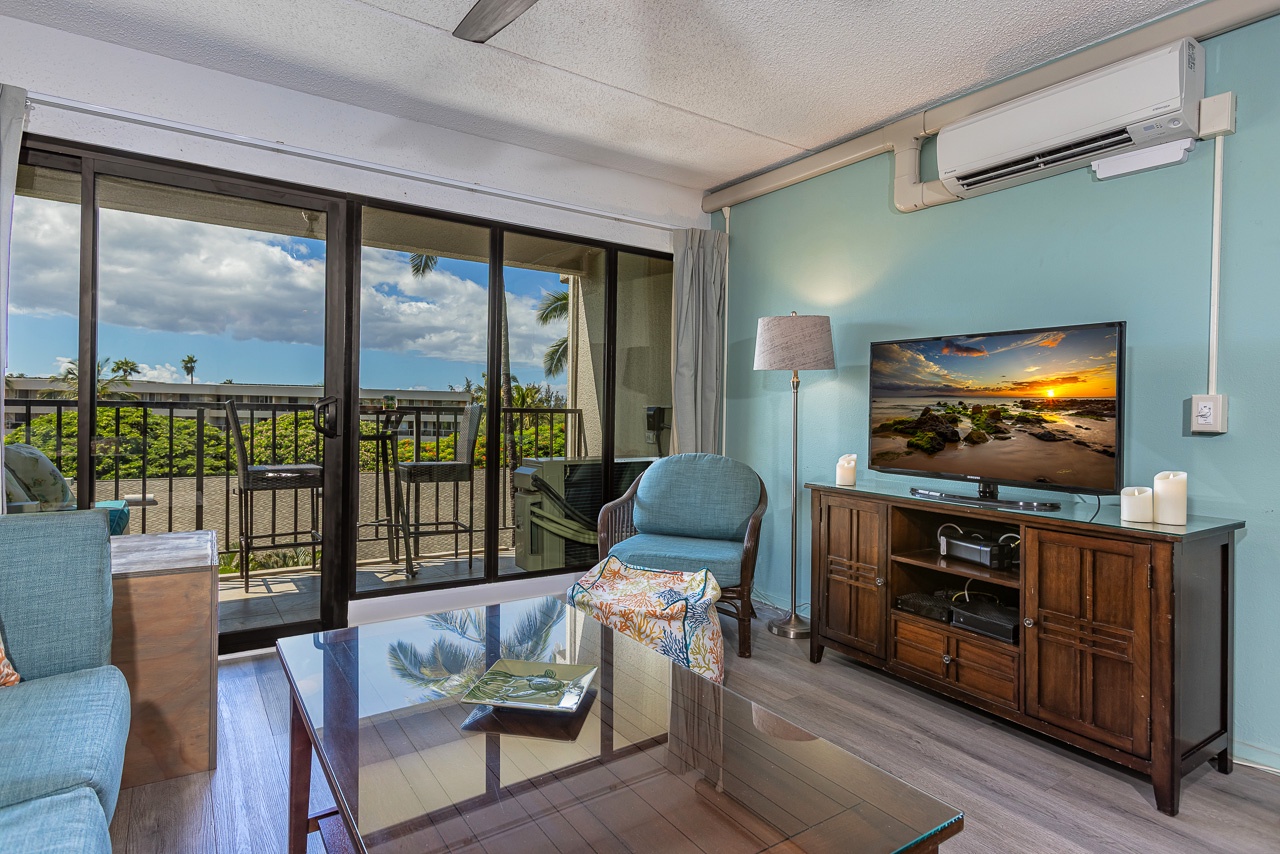 Relax in island comfort with ocean views just beyond the lanai