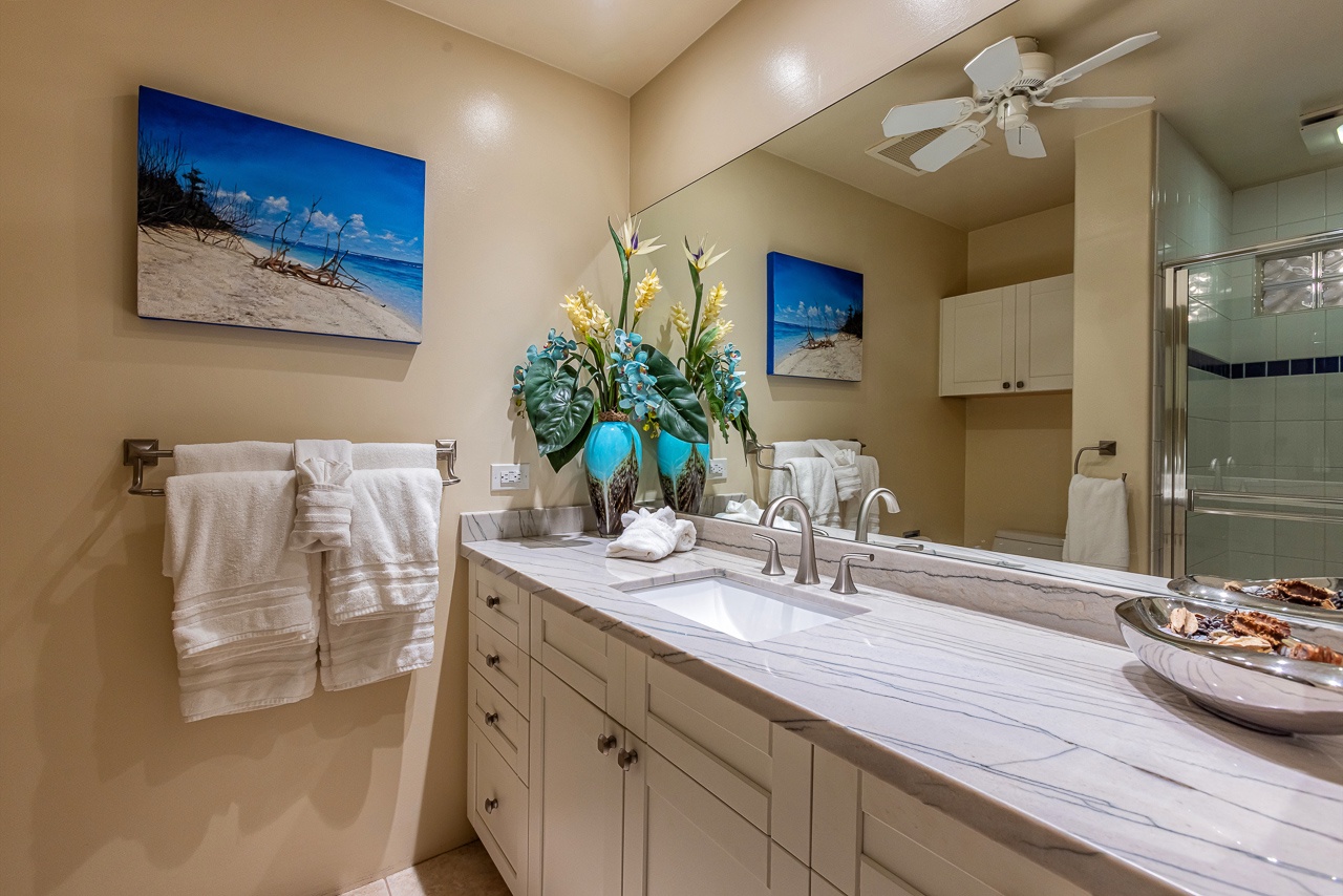 Unwind in your spa-like bathroom with elegant marble countertops, plush towels, and thoughtful touches that invite relaxation after a day of adventure.