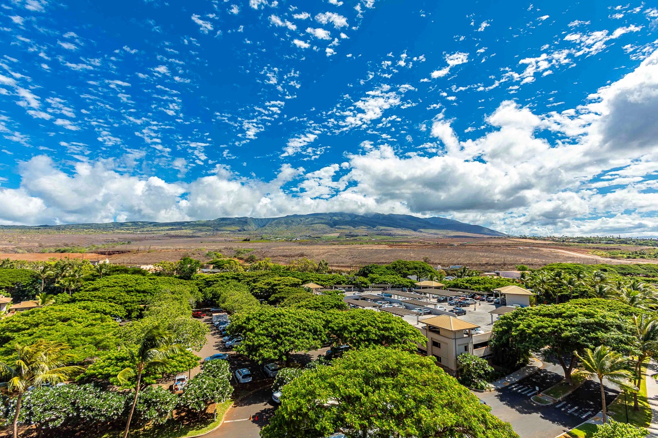 Lanai views with mountain ranges and open landscapes stretching across the horizon under a brilliant blue sky.