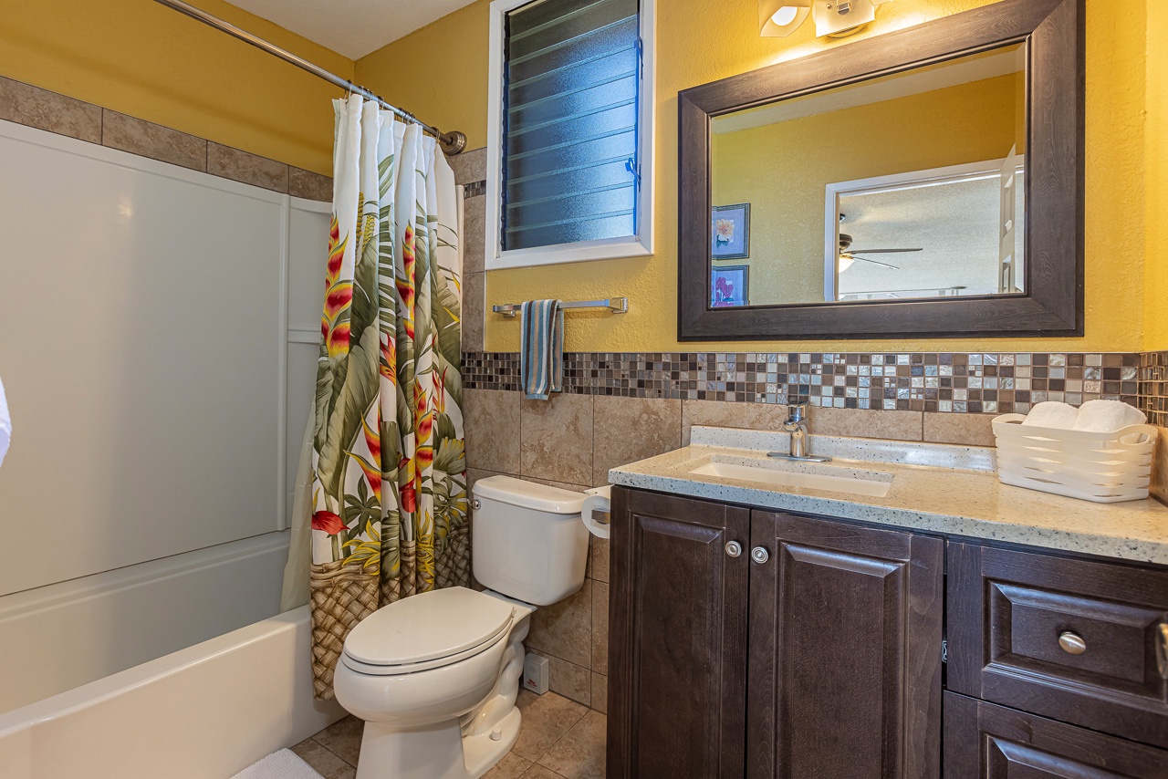 Full upstairs bath with a shower-tub and single vanity
