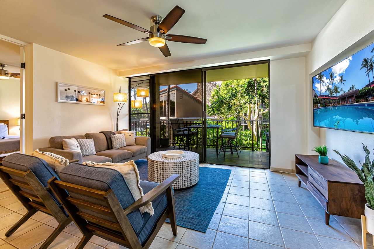  Living room with sliding glass doors to bring in the natural li