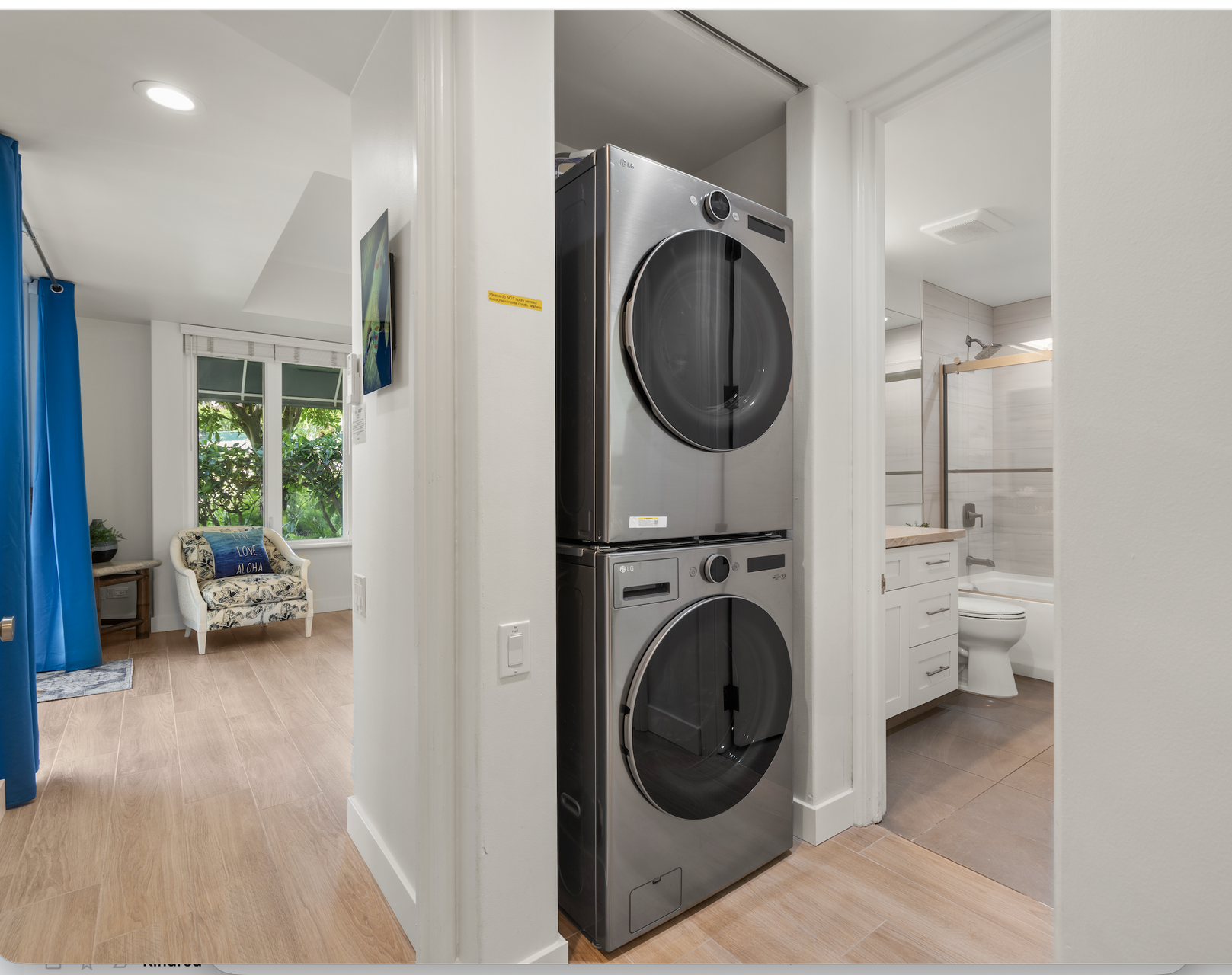 Your convenience is covered with a stacked washer and dryer tucked neatly into its own alcove, so laundry day never interrupts your vacation rhythm.
