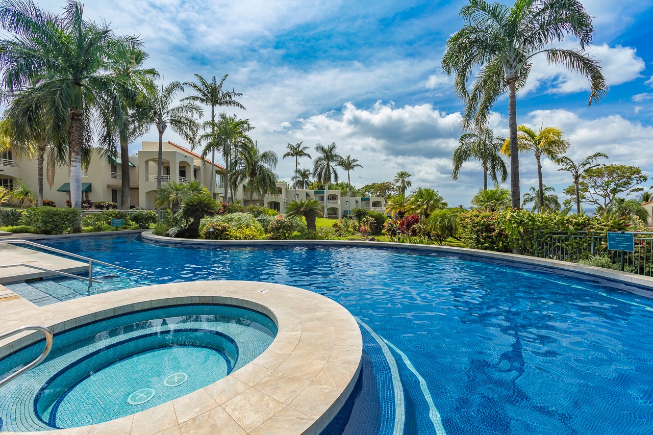 Cool off in a beautifully landscaped tropical pool or hot tub