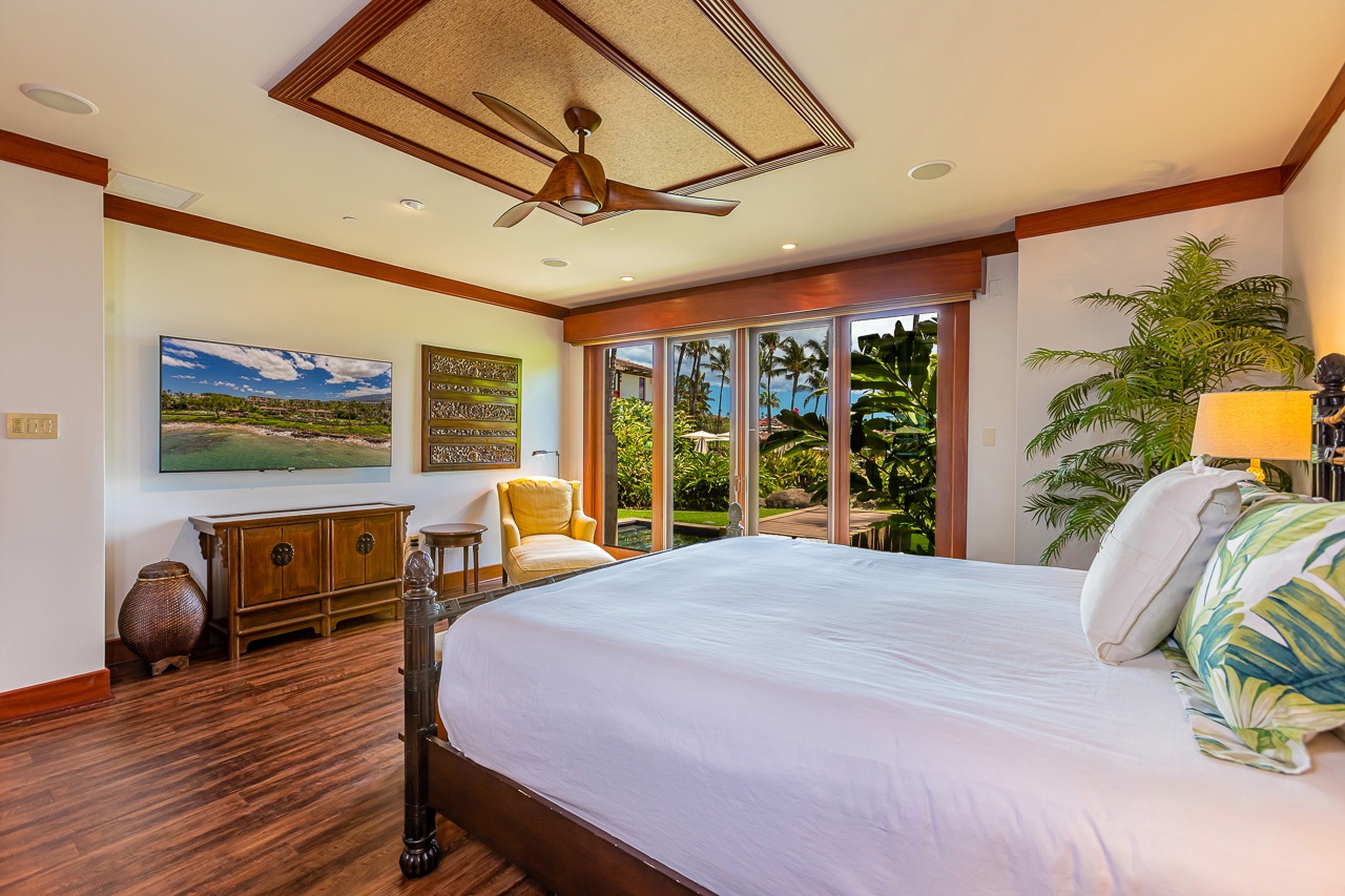 Wake to tropical breezes and lush garden views from your serene island retreat. Crisp linens and elegant wood accents create a peaceful sanctuary for restorative rest.