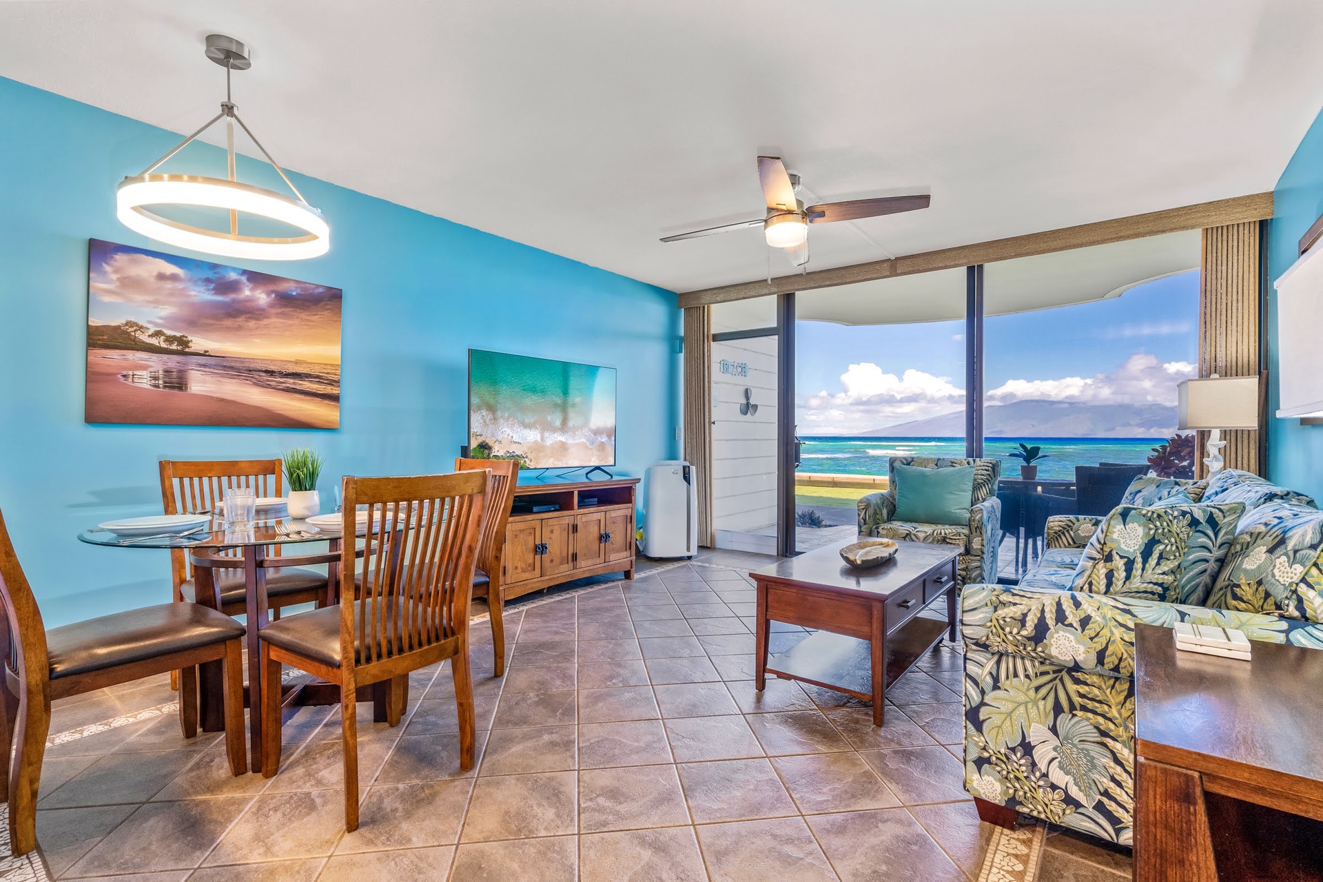 Coastal sanctuary with vibrant turquoise walls and tropical decor.