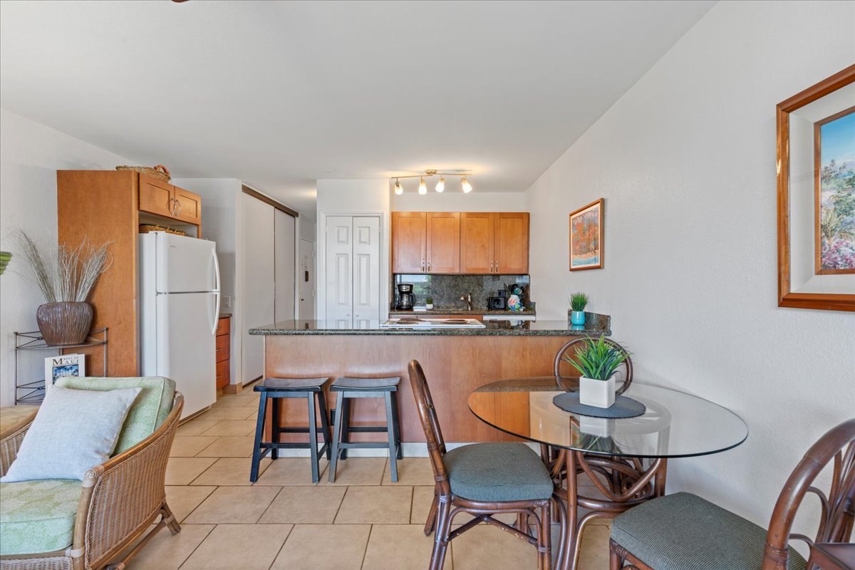 Step into your island retreat where an open-concept kitchen and dining area create the perfect setting for morning coffee or gathering with loved ones after a day exploring paradise.