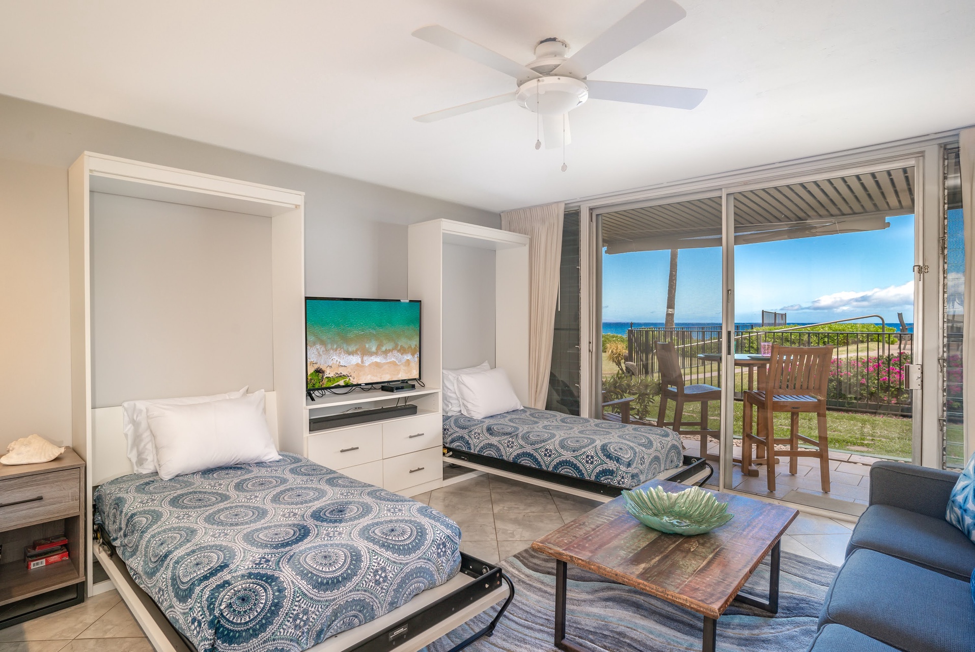 The living room offers extra sleeping space with two twin Murphy beds and a TV for your enjoyment.