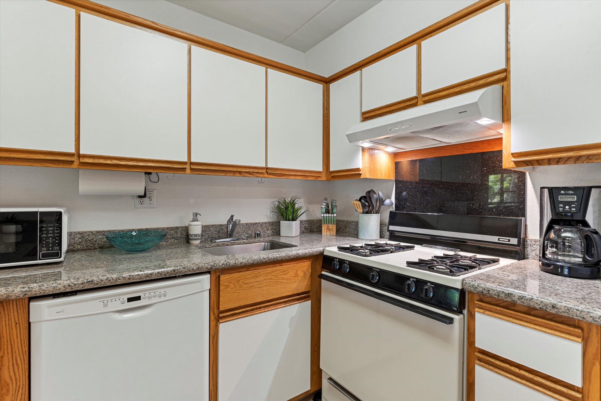 Your fully equipped kitchen comes with everything you need to whip up delicious home-cooked meals. Granite counters, full-size appliances, and plenty of cabinet space make cooking here a breeze.