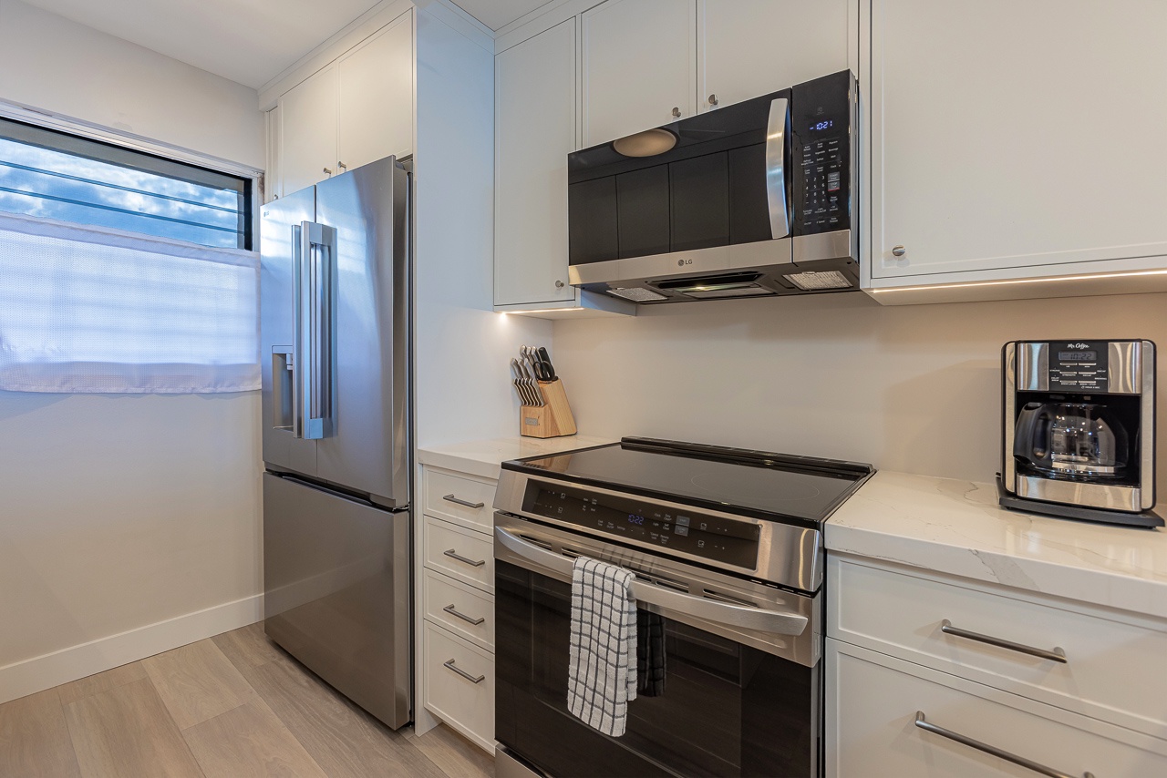 Modern design with full size stainless appliances