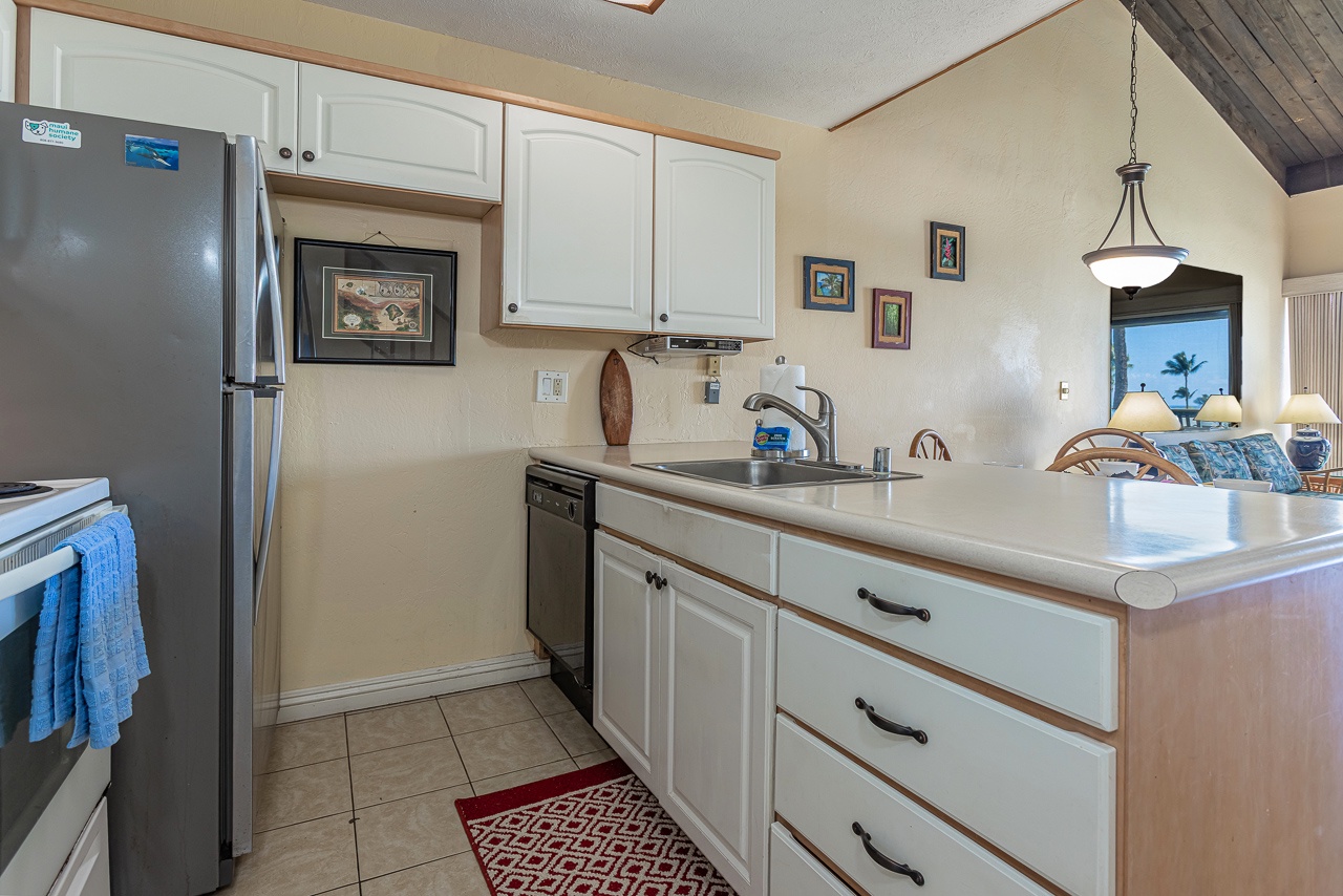 Well appointed kitchen for meals after sun filled Maui days