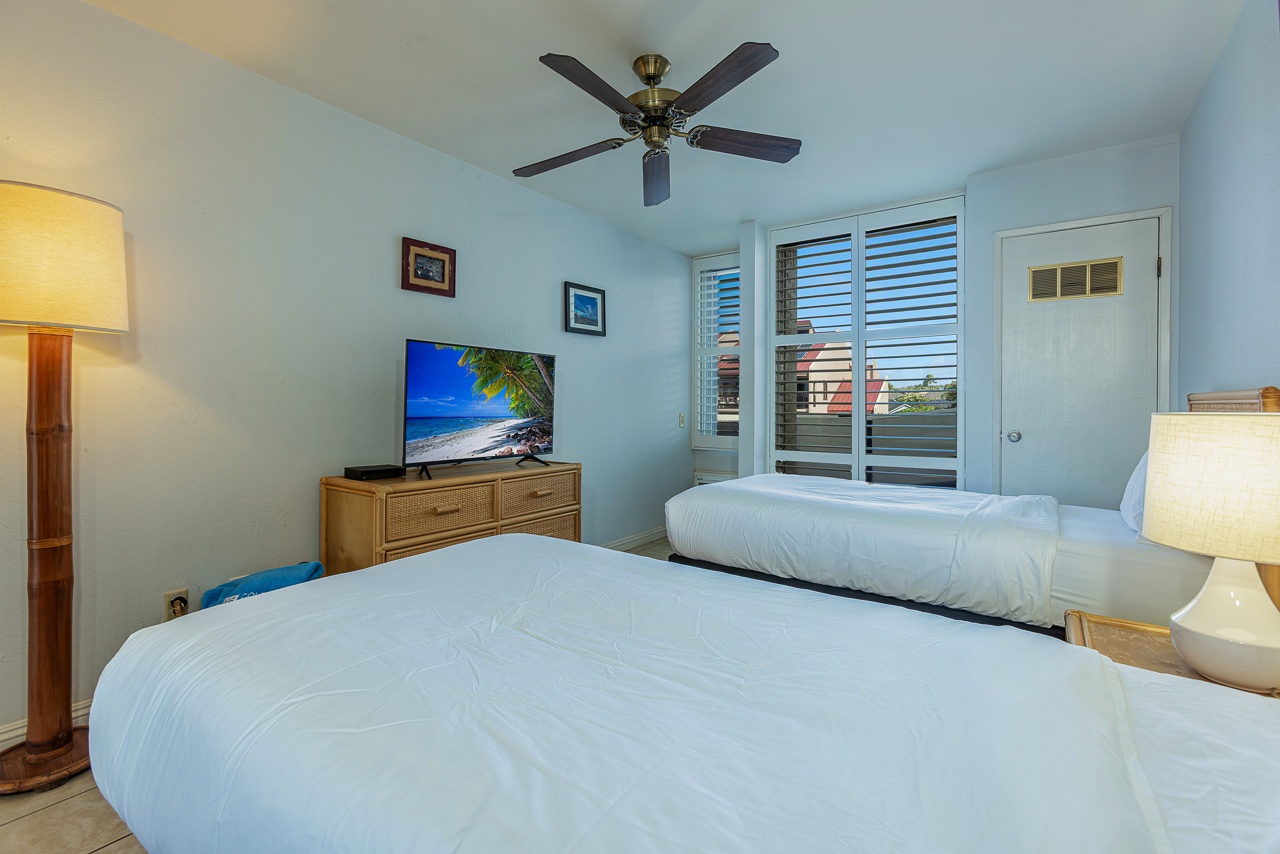 Bright twin bedroom with a relaxed Maui feel