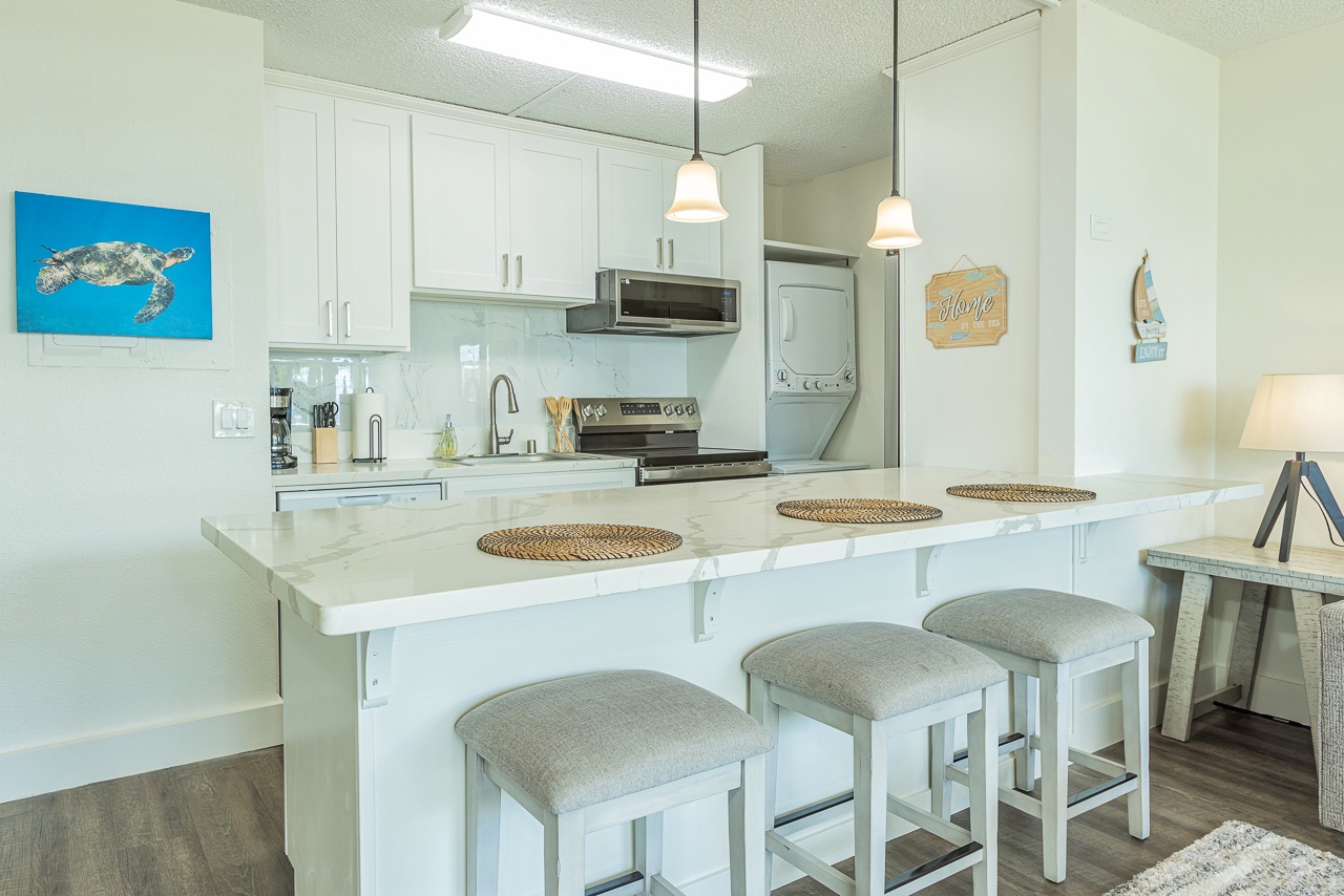 Sit, sip, and enjoy Maui vibes at the bar with seating for three