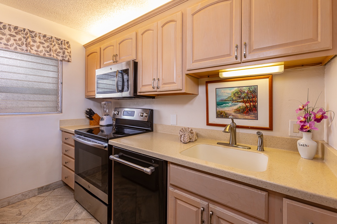 Counter space for prepping meals~ full size sink & dishwasher.
