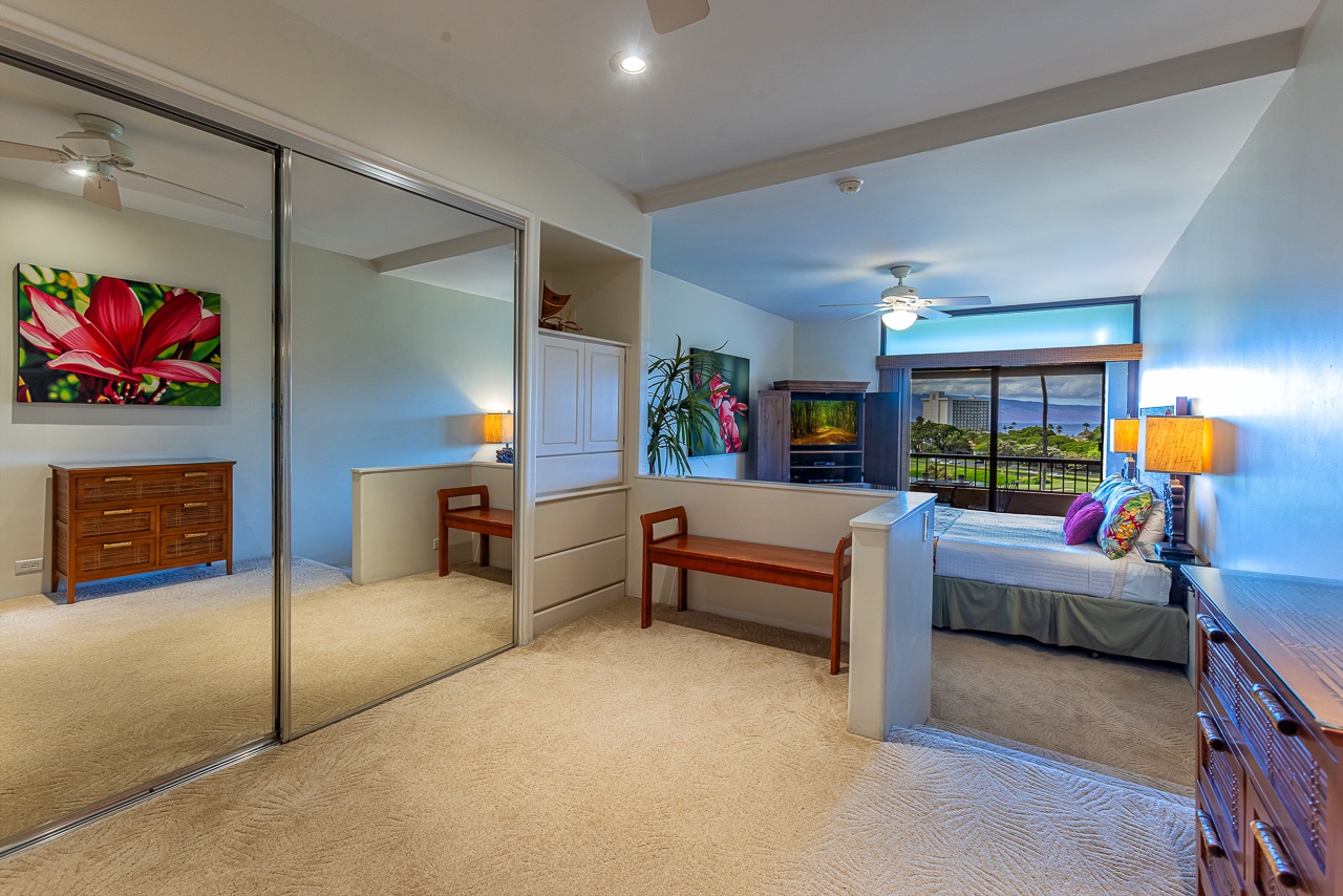 Bright and spacious retreat with cozy sleeping areas and plenty of room to unwind. Slide open the mirrored closets to stow your belongings, and step through the open layout into the inviting bedroom nook.