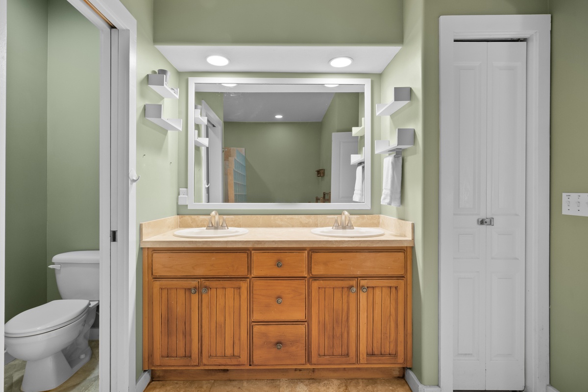 Your spacious bathroom features a beautiful double vanity.