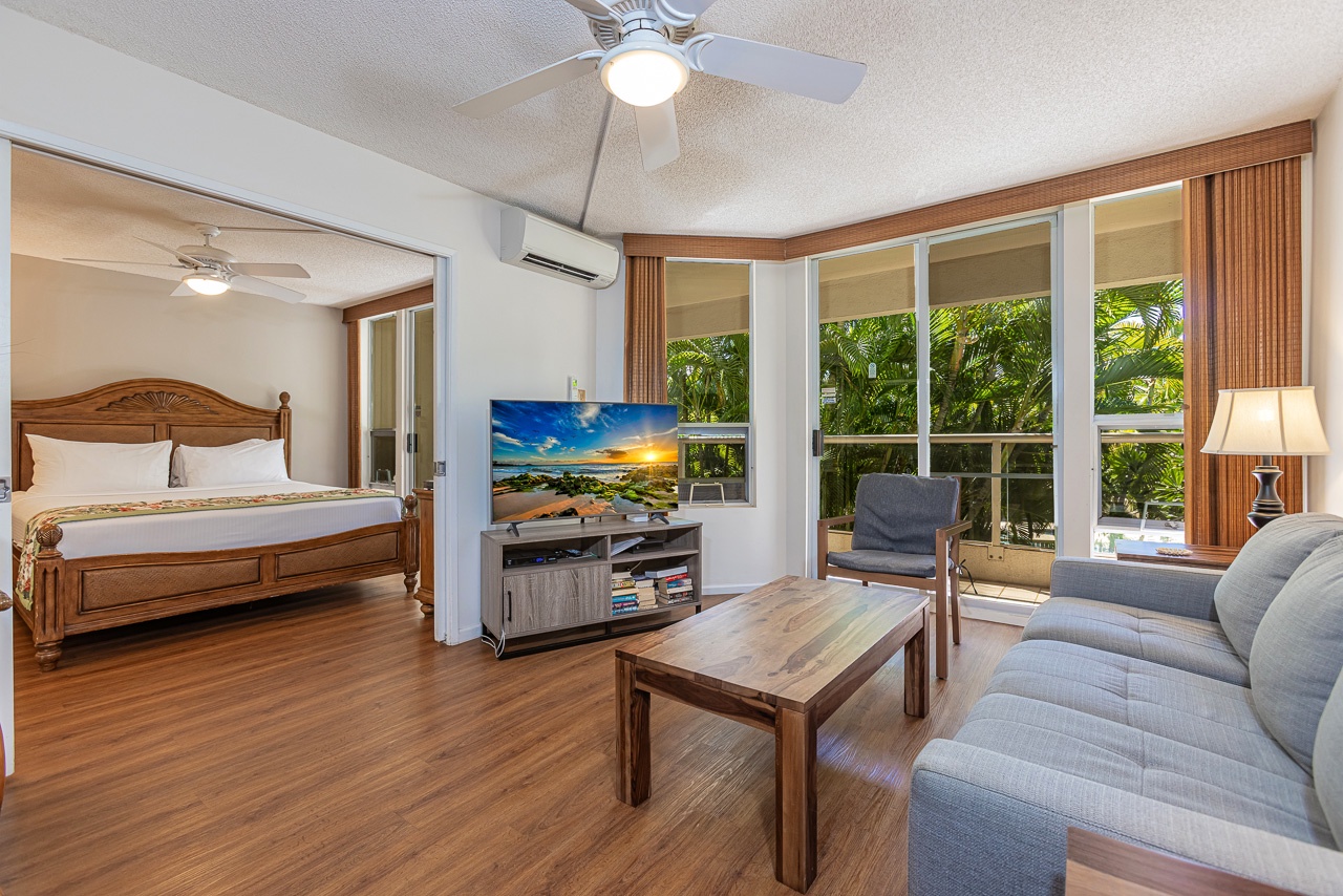 Relax in the cozy living space with a smart TV and AC comfort