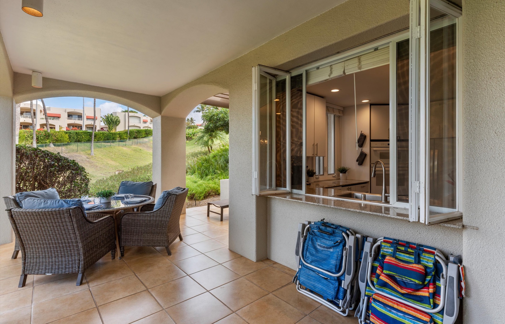 Your private covered terrace opens to a lush garden, with room to dine alfresco and relax in comfort.