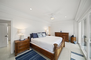 Guest Room #5 (1st floor) w/king bed, ocean views, deck & shared full bath.