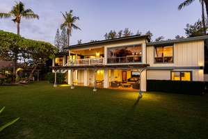 The home’s beautiful architecture shines at sunset, creating a magical evening glow.