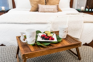 Welcome tray with fresh fruit and drinks in the guest suite.