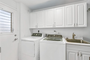 Dedicated laundry room with full-size washer and dryer—perfect for extended stays and added comfort.
