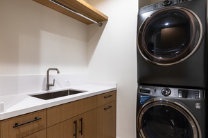 Your home has a dedicated laundry area with a washer and dryer for added convenience.