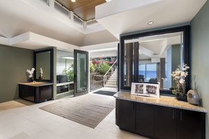 Step into your private sanctuary where modern elegance meets coastal tranquility, with sleek surfaces and ocean views creating the perfect retreat.