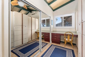 Convenient workspace behind the bedroom, perfect for writing postcards or catching up on emails.