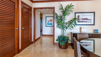 Feel at home with tropical décor and a welcoming hallway leading to your retreat.