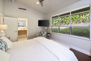 Guest bedroom with Cal king bed and split AC, comfy and cozy for your stay.