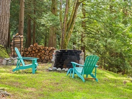 Gather around the fire pit under the trees for cozy evenings and s’mores under the stars.