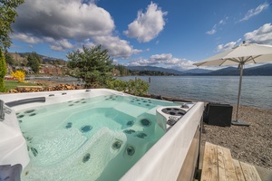 Soak and unwind in the lakeview hot tub—designed for relaxation and framed by mountain-meets-water serenity.