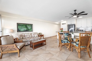 Spacious and sun-filled layout, connecting living, dining, and kitchen areas for easy vacation living.