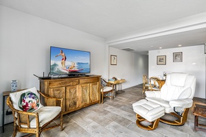 Settle in for a cozy movie night or catch up on your favorite shows in the comfortable lounge area.
