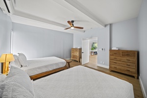 Bedroom 4 with 2 queen beds and full-sized dressers—ideal for teens or group stays.