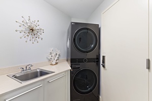The in-unit laundry at Wailea Hoolei 93-3 includes a washer and dryer for added convenience.